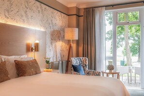Superior King with Balcony | Premium bedding, desk, blackout drapes, soundproofing