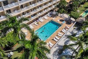 Outdoor pool, open 9:00 AM to 6:00 PM, pool umbrellas, sun loungers