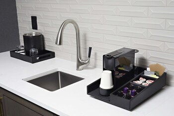 Hotel amenities such as safe, desk and work area at Washington Hilton