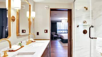 Combined shower/tub, designer toiletries, hair dryer, towels
