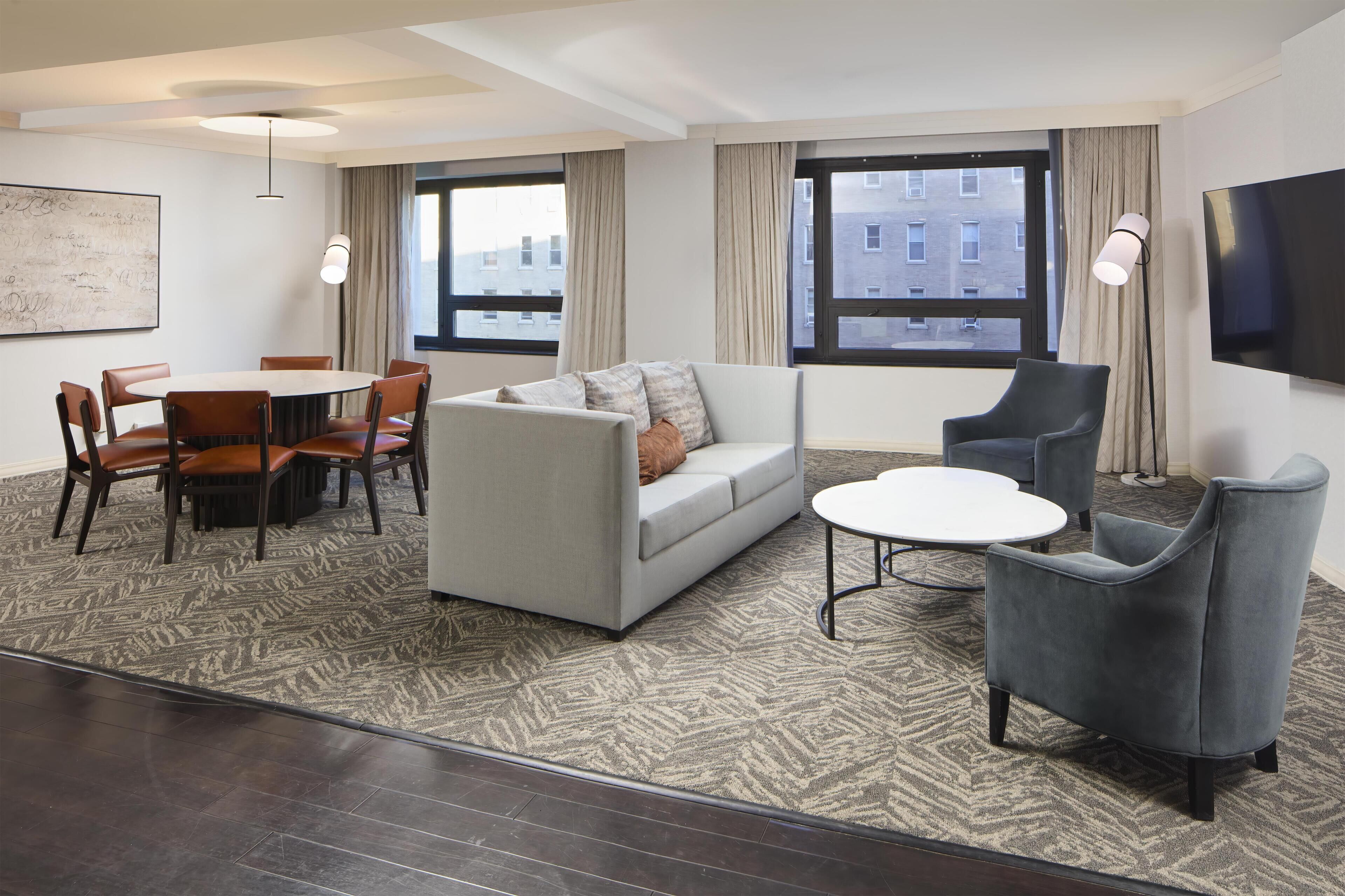 Suite, 1 King Bed (Dupont Suite) | Living area | 55-inch LCD TV with cable channels, TV