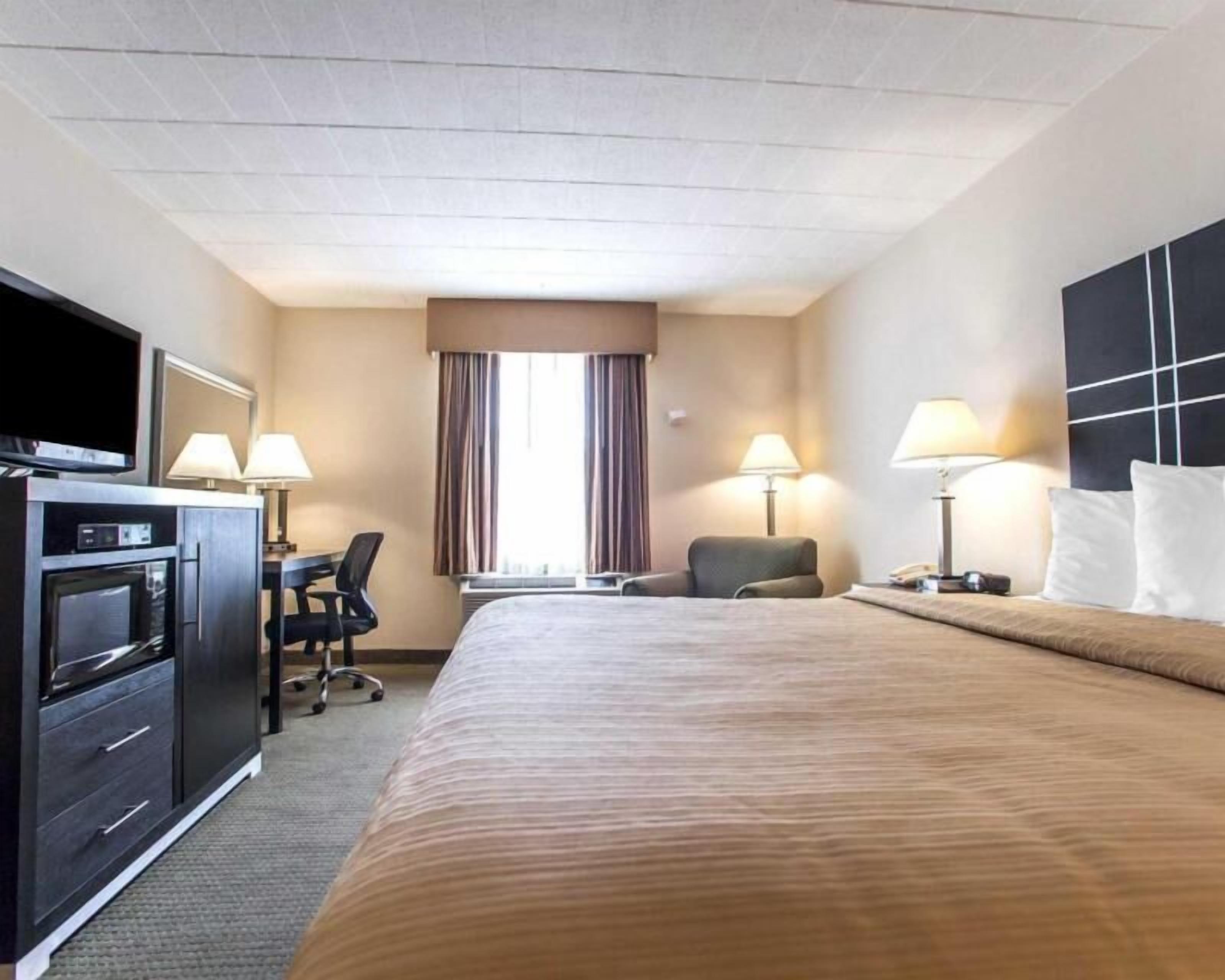 Premium bedding, down duvets, in-room safe, desk