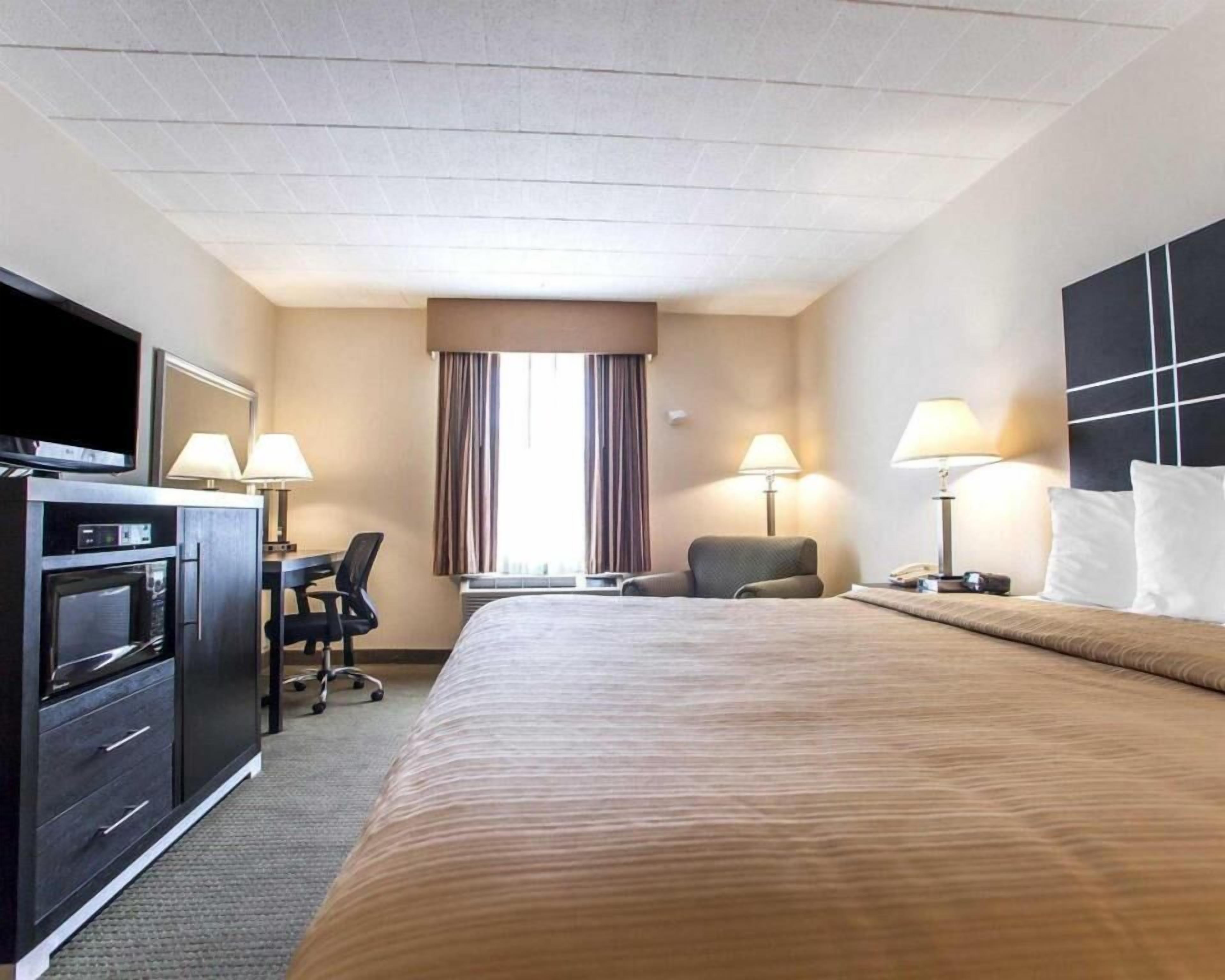 Premium bedding, down duvets, in-room safe, desk