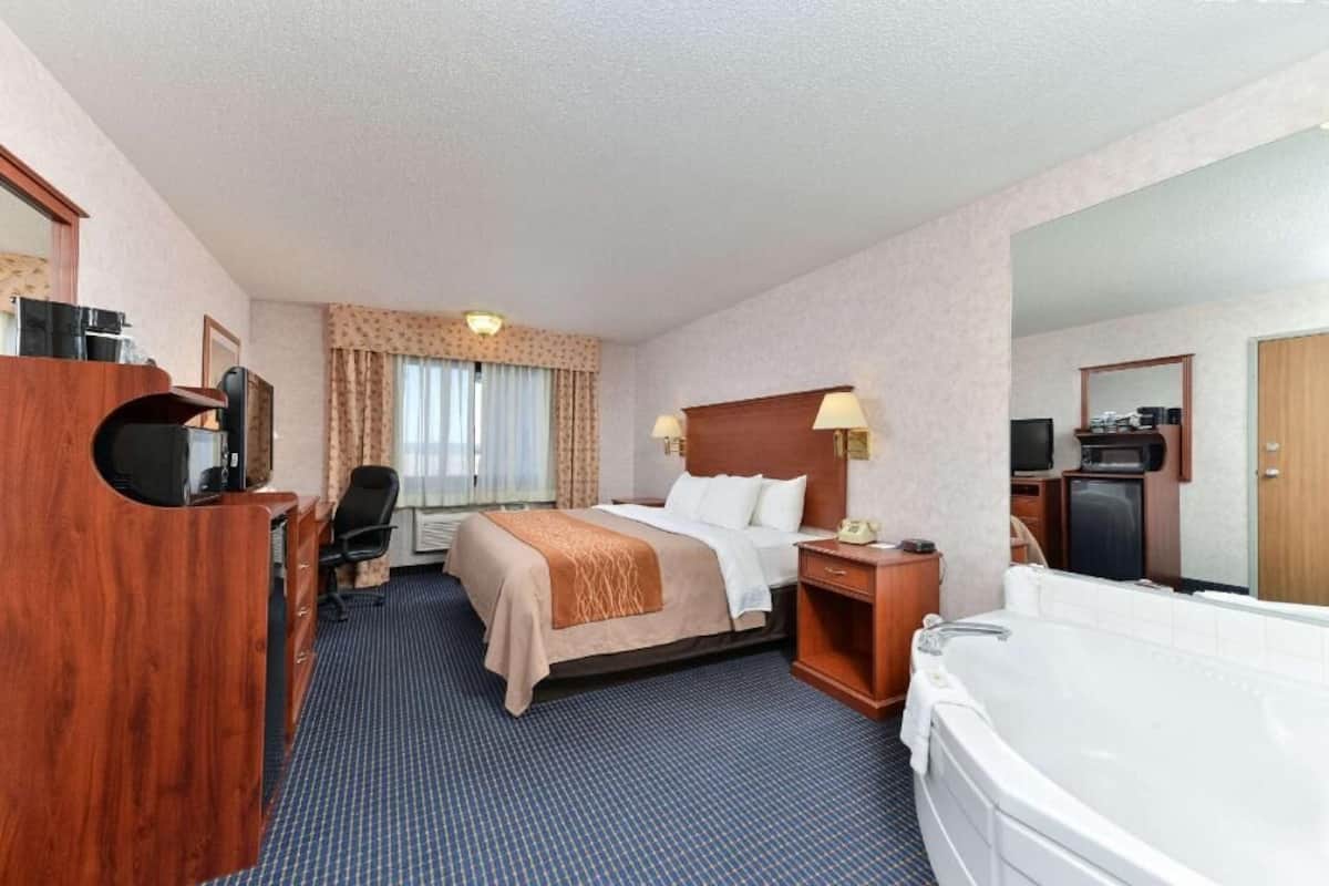 Premium bedding, desk, blackout drapes, soundproofing