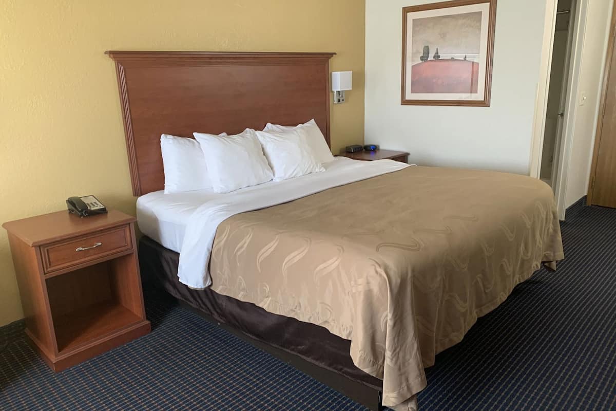 Premium bedding, desk, blackout drapes, soundproofing