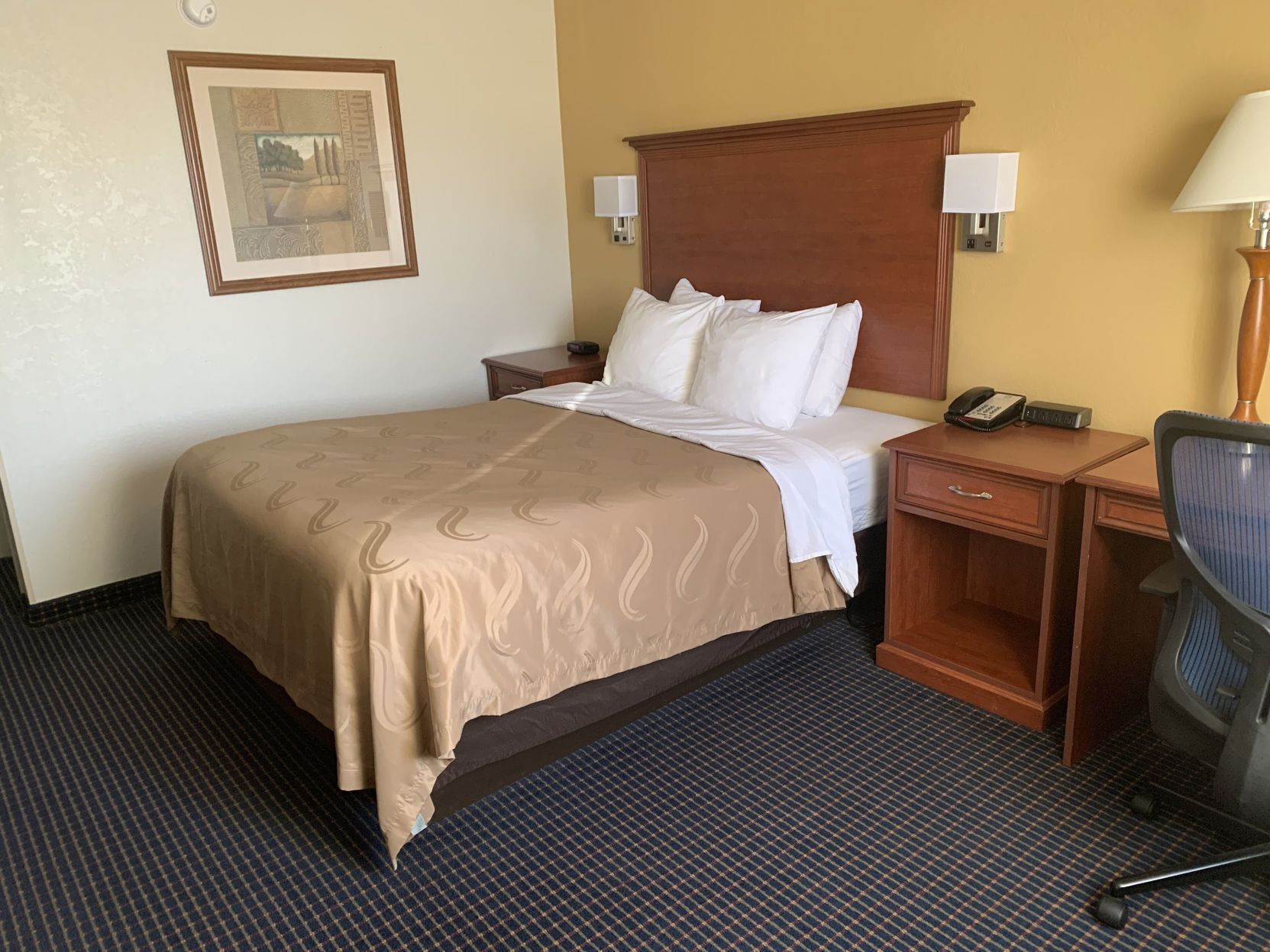 Premium bedding, desk, blackout drapes, soundproofing