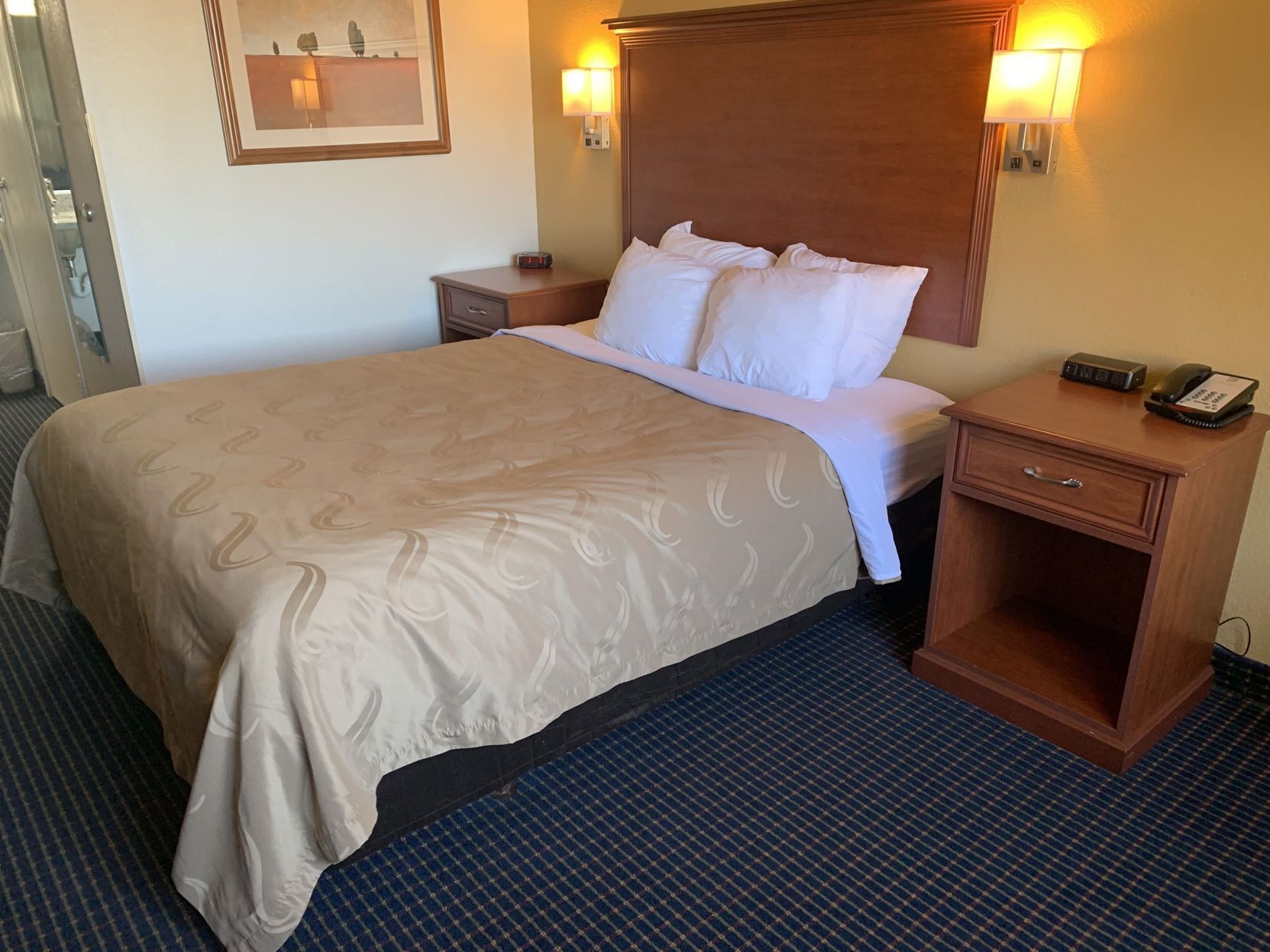 Premium bedding, desk, blackout drapes, soundproofing