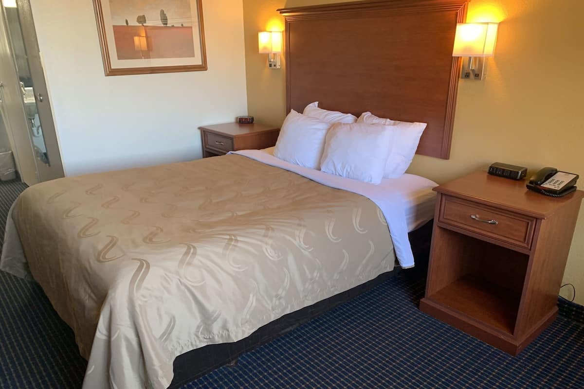 Premium bedding, desk, blackout drapes, soundproofing