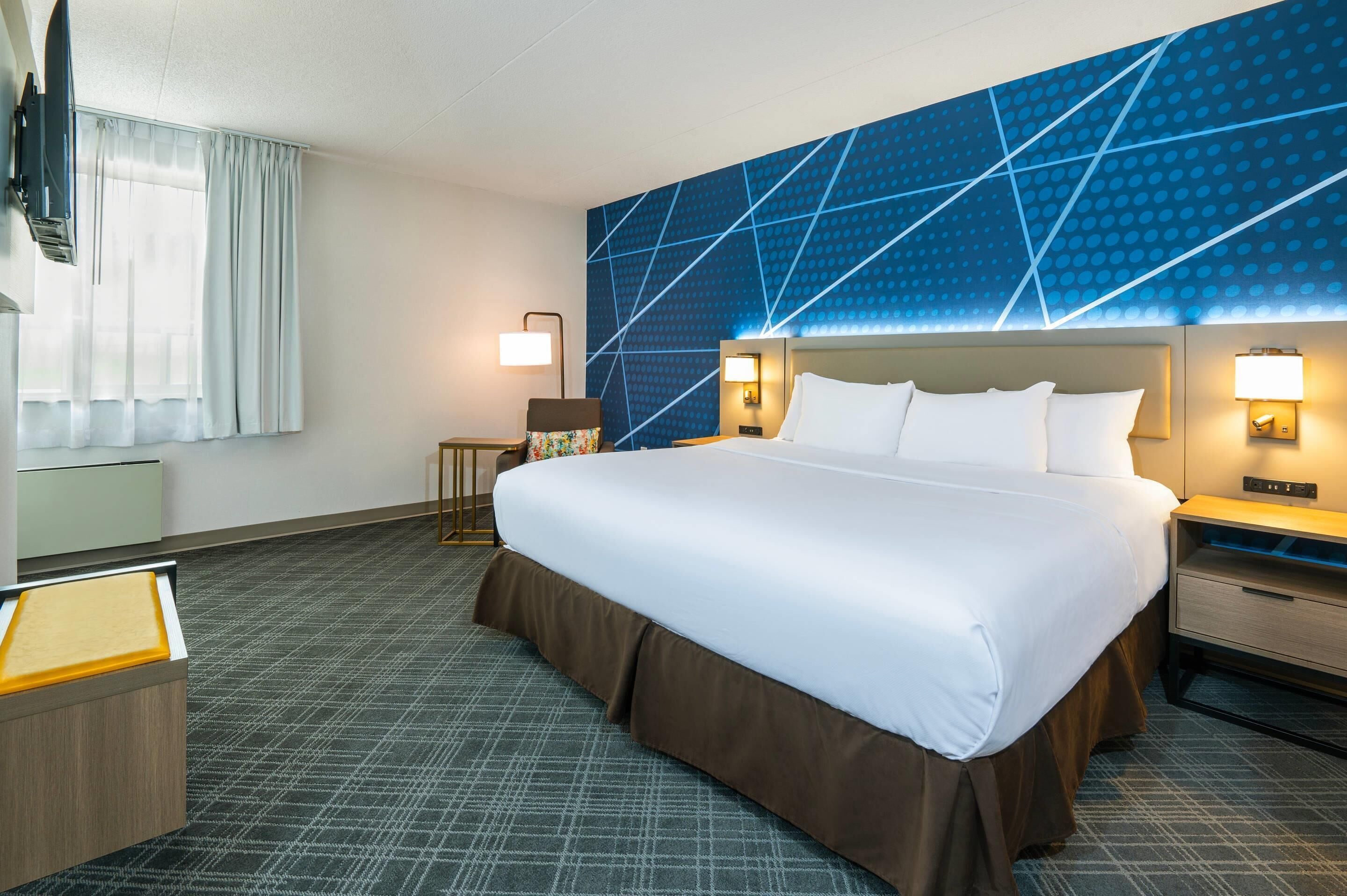 Desk, blackout drapes, iron/ironing board, rollaway beds