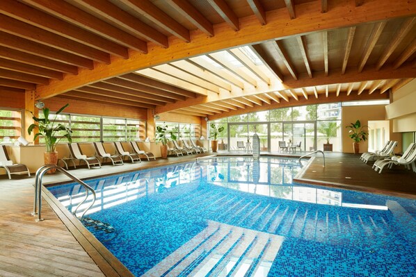 Indoor pool, open 7:00 AM to 9:00 PM, sun loungers