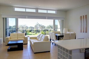 Superior Apartment, 4 Bedrooms | Living area | 40-inch LCD TV with digital channels, TV, table tennis - Opal Cove Resort (Korora)