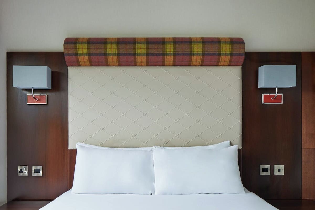 Hypo-allergenic bedding, desk, blackout drapes, iron/ironing board