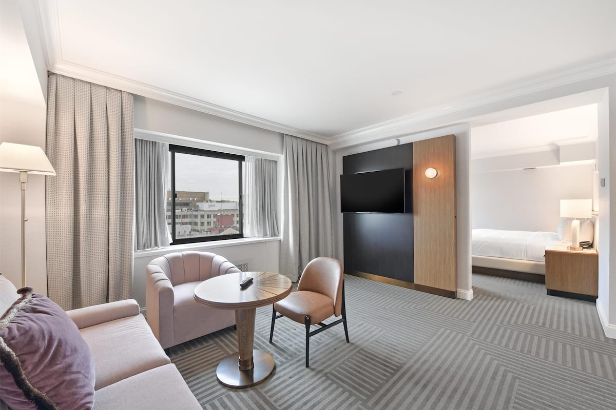Superior Suite, 1 King Bed | Living area | 55-inch TV with digital channels, pay movies