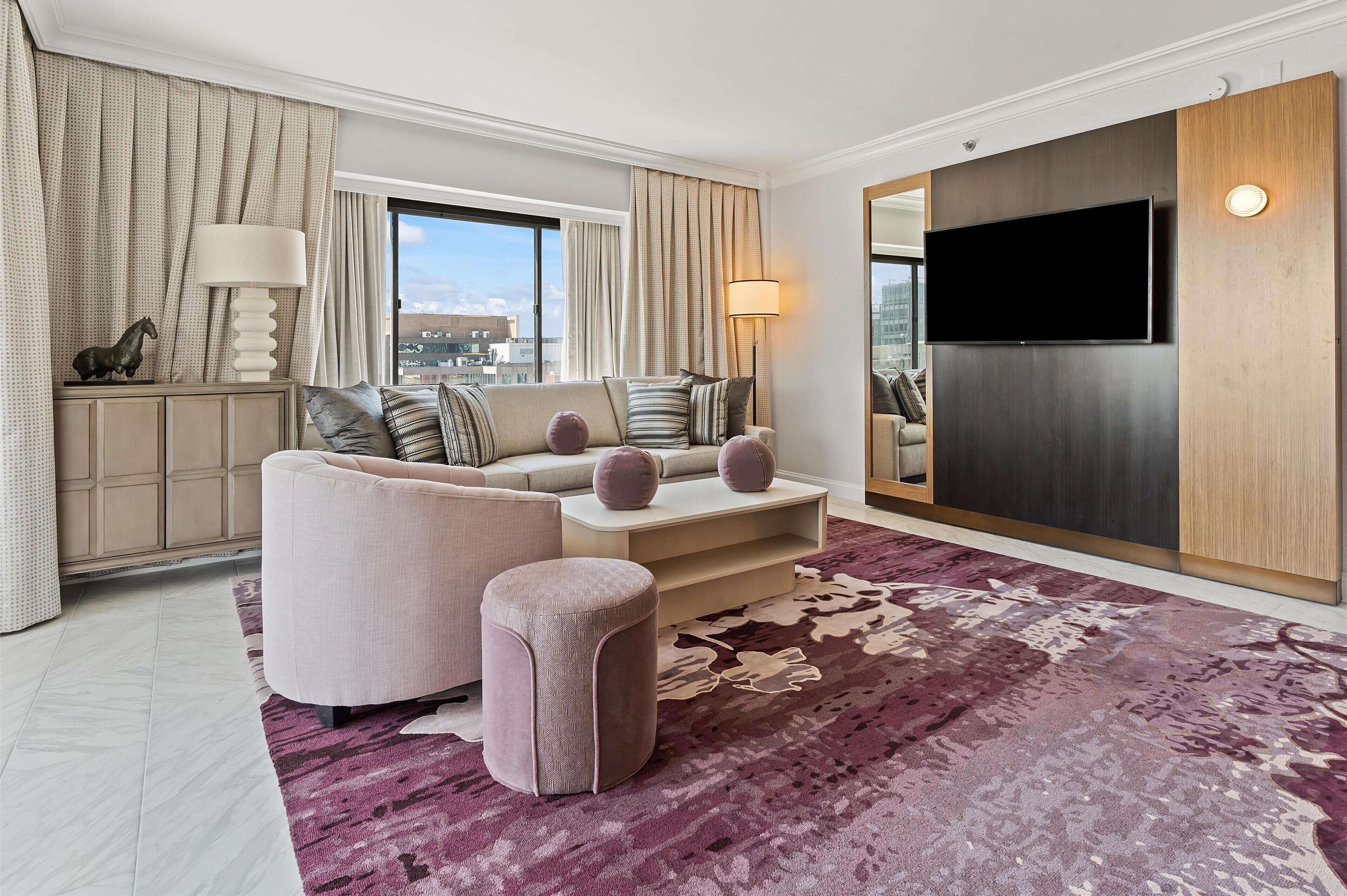 Presidential Suite, 1 King Bed | Living area | 55-inch TV with digital channels, pay movies