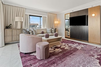 Presidential Suite, 1 King Bed | Living area | 55-inch TV with digital channels, pay movies at Capital Hilton