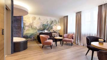 Hypoallergeen beddengoed, een minibar, een kluis op de kamer, een bureau