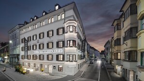 A historic hotel with a classic European facade, multiple stories, and a corner location. - Hotel Schwarzer Adler (Innsbruck)
