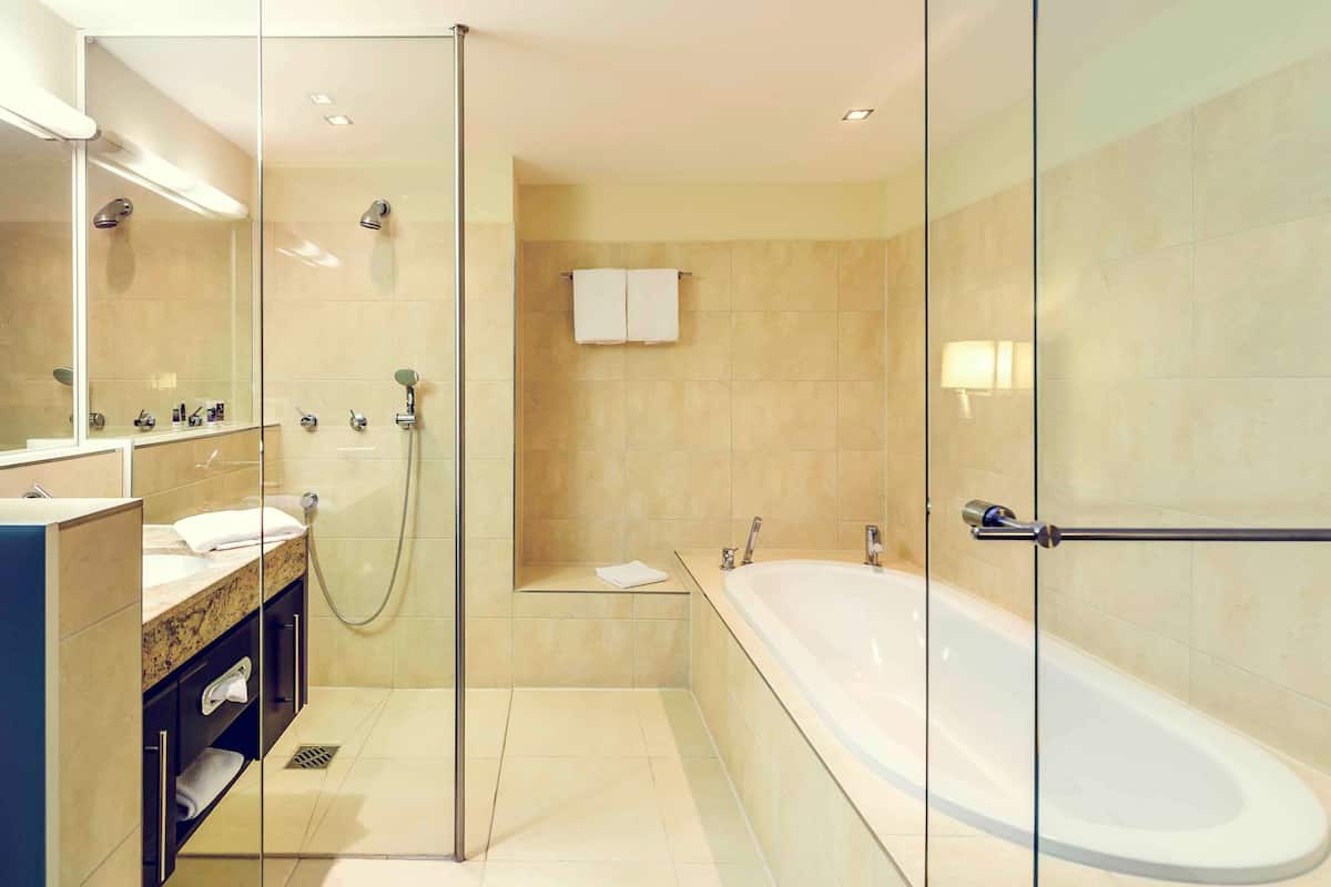 shower, eco-friendly toiletries, hair dryer, towels