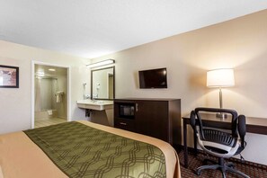 Desk, laptop workspace, blackout drapes, iron/ironing board
