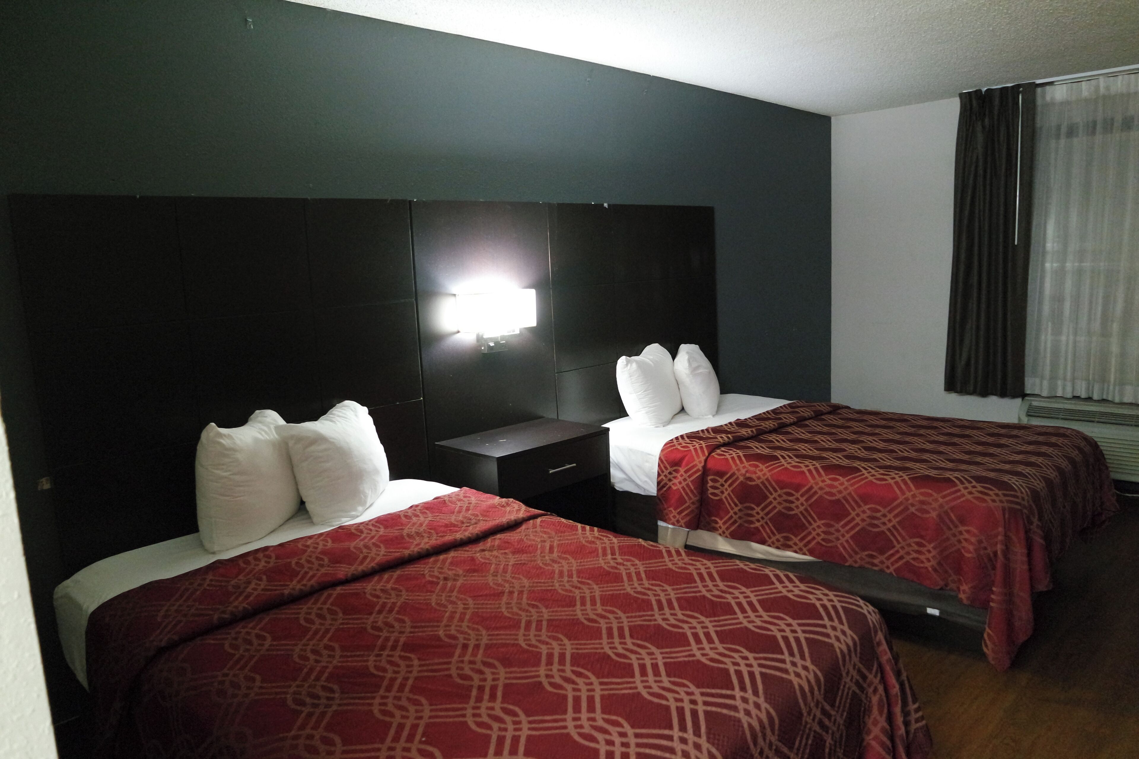 Desk, laptop workspace, blackout curtains, iron/ironing board