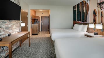 Premium bedding, desk, laptop workspace, blackout curtains