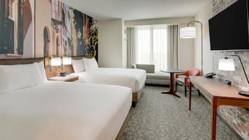 Premium bedding, desk, laptop workspace, blackout curtains