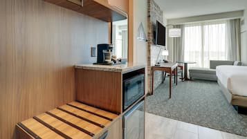 Premium bedding, desk, laptop workspace, blackout curtains