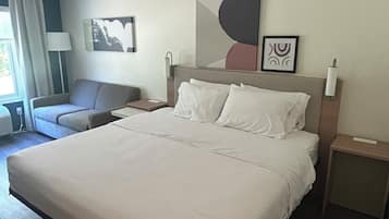 Room, 1 King Bed with Sofa bed | Pillowtop beds, desk, laptop workspace, blackout drapes