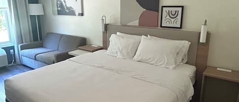 Room, 1 King Bed with Sofa bed | Pillowtop beds, desk, laptop workspace, blackout drapes