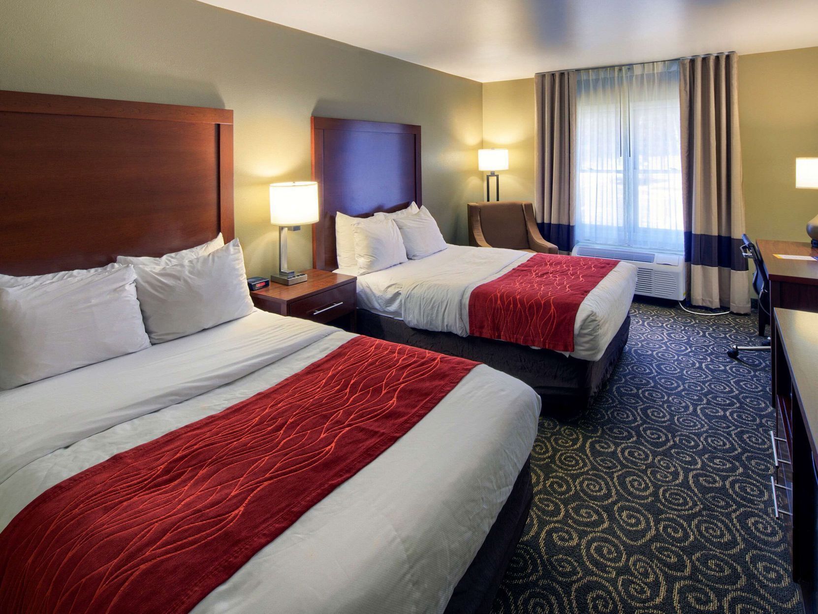 Pillowtop beds, desk, laptop workspace, blackout drapes