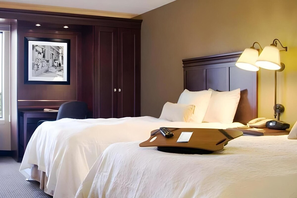 Premium bedding, desk, blackout drapes, iron/ironing board