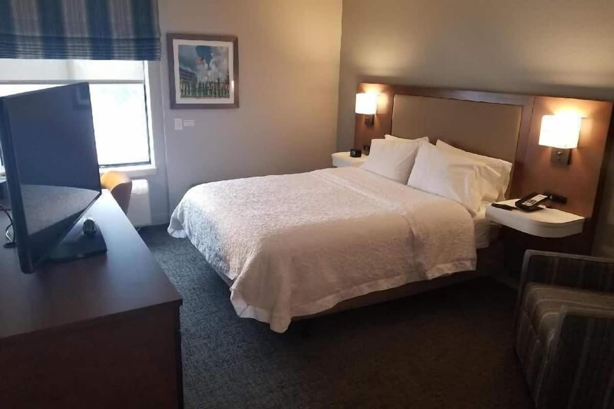 Premium bedding, desk, blackout drapes, iron/ironing board