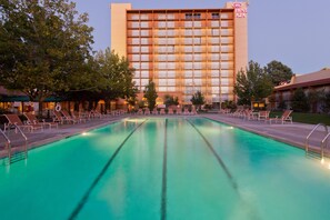 Seasonal outdoor pool, open 10:00 AM to 8:00 PM, pool umbrellas