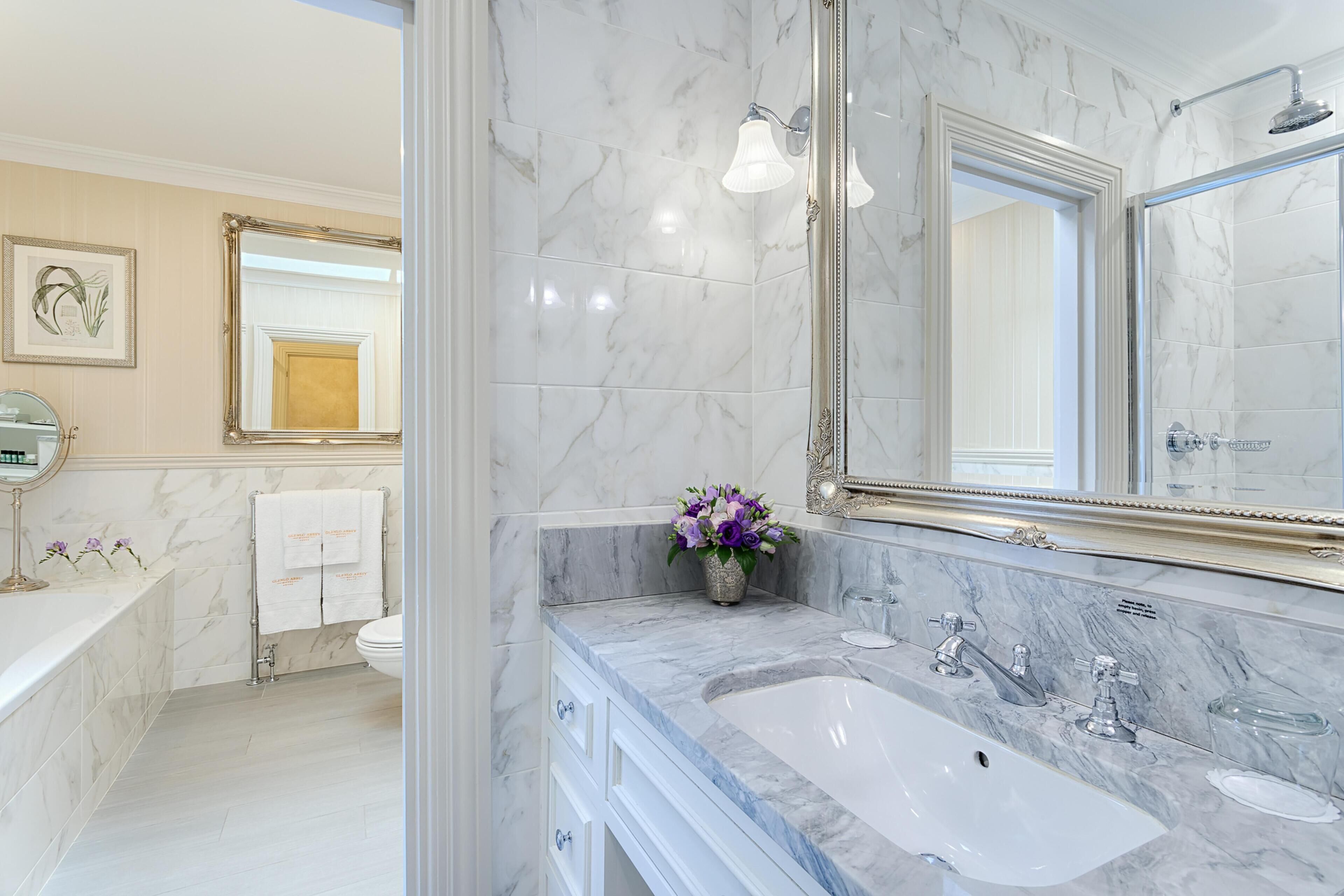 grand suite, 1 king bed | bathroom | combined shower/bathtub, hair dryer, bathrobes, slippers