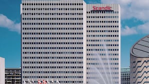 A high-rise building with a grid-like facade and the name 'Scandic' on the side. - Scandic Copenhagen (Copenhagen)