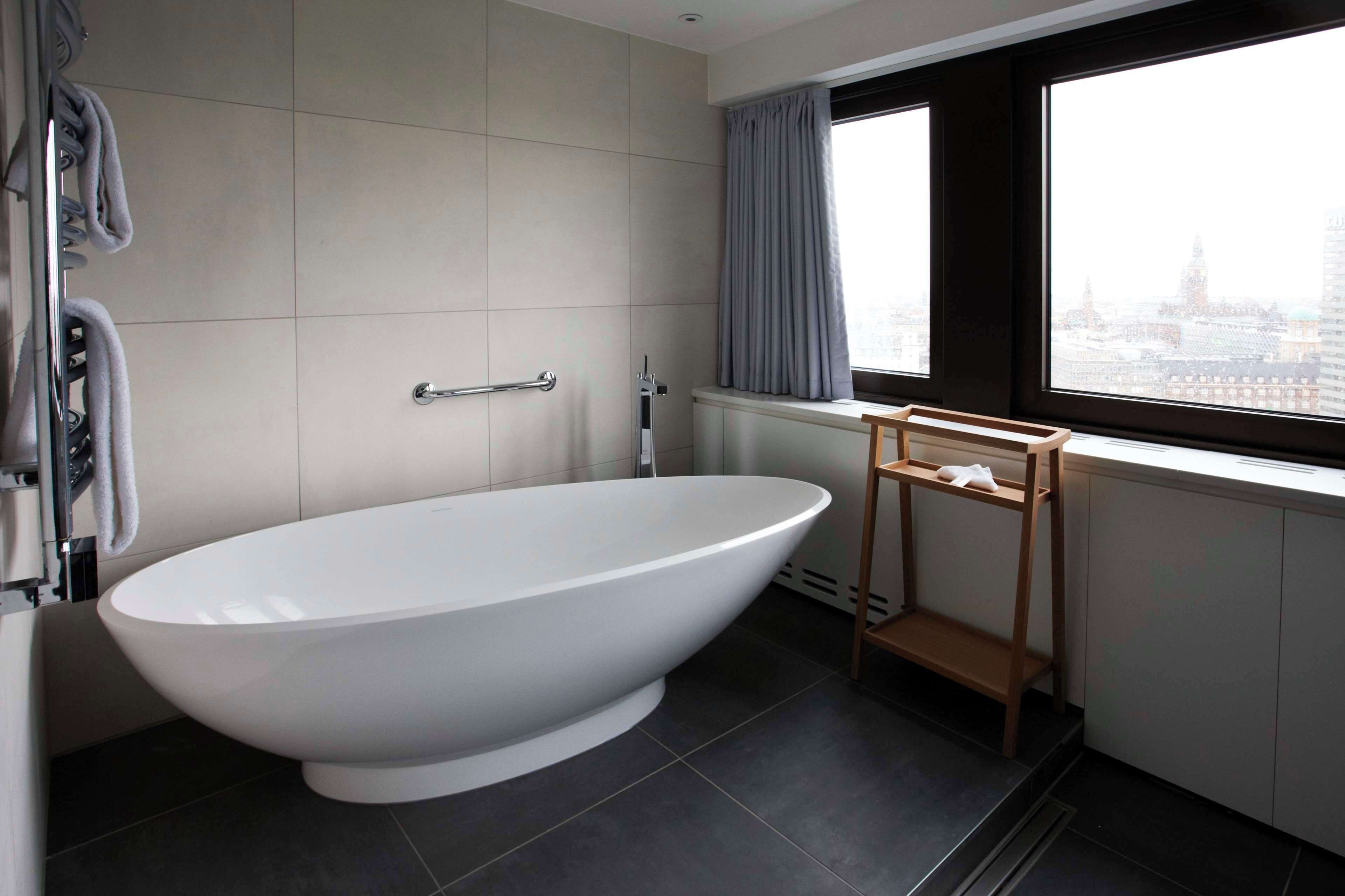 presidential suite | bathroom | shower, hair dryer, heated floors, towels