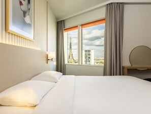 Premium bedding, in-room safe, desk, soundproofing