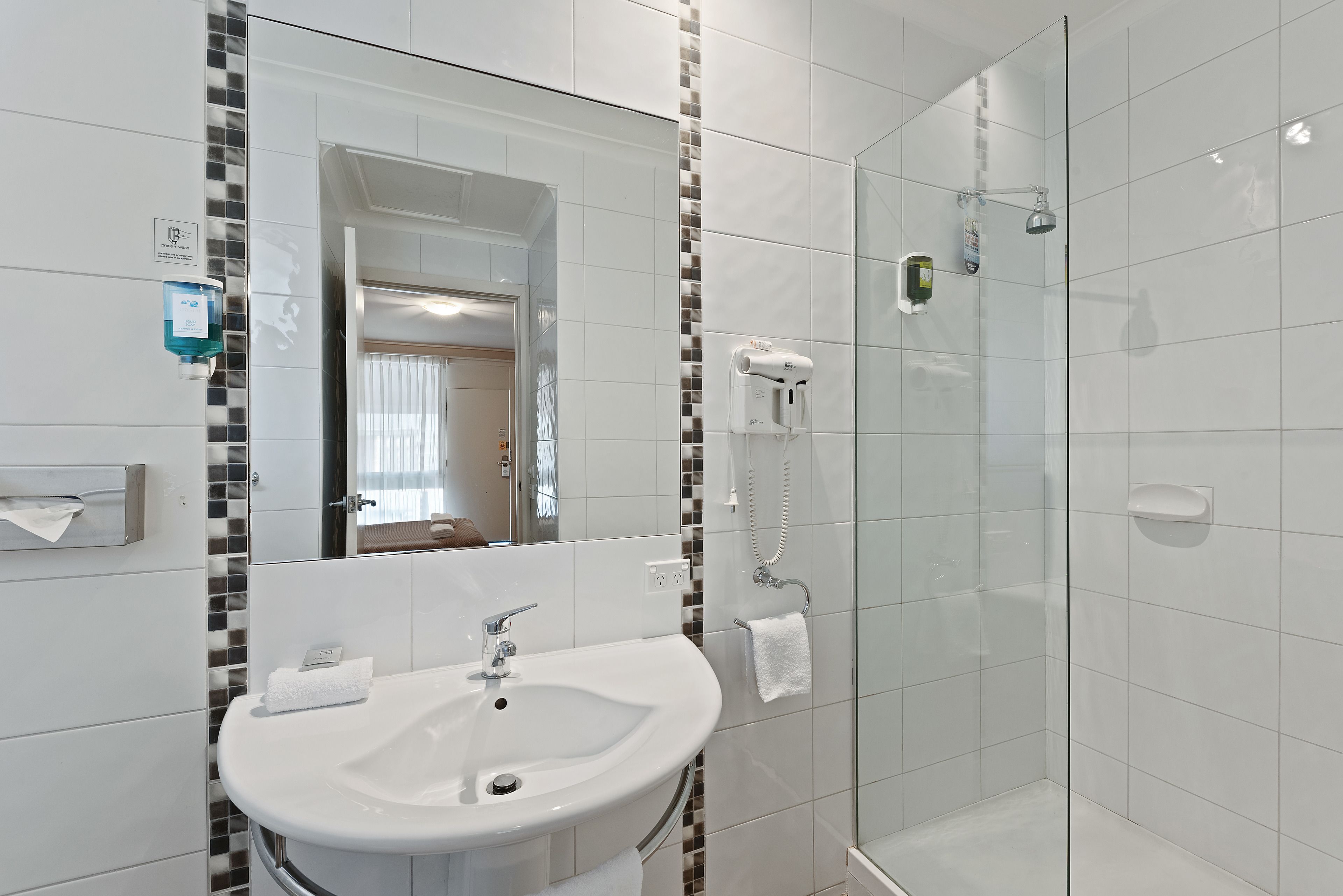 Shower, hair dryer, towels