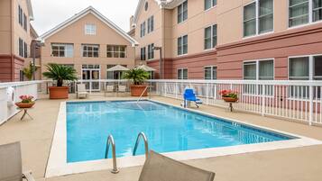 Seasonal outdoor pool, pool umbrellas, pool loungers