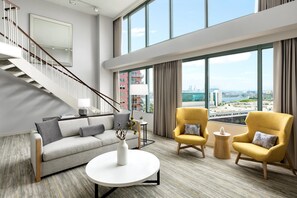 Suite, 1 King Bed | Living area | LCD TV, pay movies