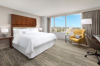 In-room safe, desk, laptop workspace, blackout drapes at The Westin Long Beach