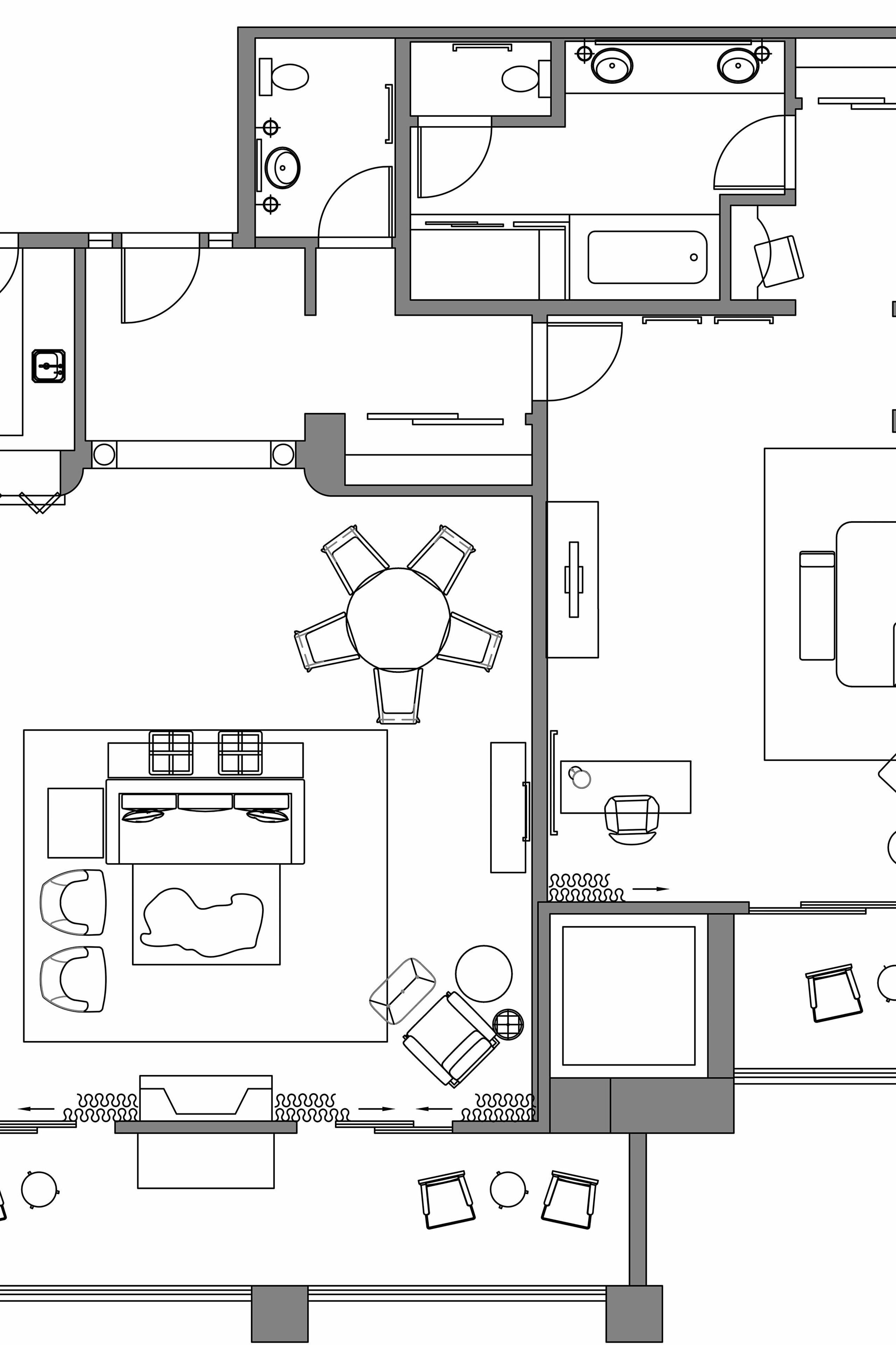 A hotel floor plan with a central dining area, multiple bedrooms, a kitchen, and a bathroom.