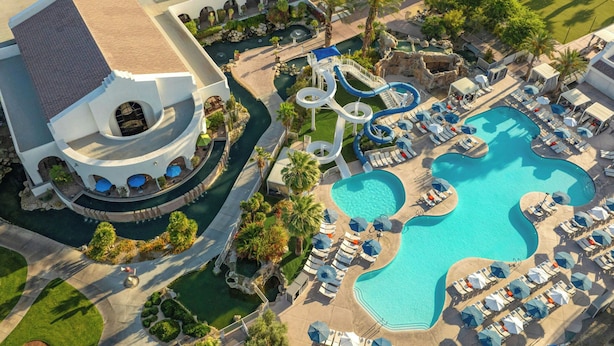 An aerial view of a resort with a large pool, water slides, and sun loungers. - The Westin Rancho Mirage Golf Resort & Spa (Rancho Mirage)