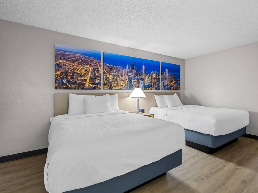 Camera, 2 letti queen, non fumatori | Una scrivania, tende oscuranti, Wi-Fi gratuito, lenzuola