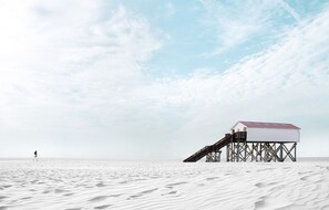 On the beach, white sand