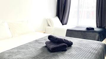 Premium bedding, individually furnished, laptop workspace