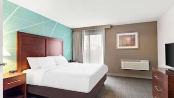 Room, 1 King Bed, Non Smoking | Hypo-allergenic bedding, blackout drapes, iron/ironing board