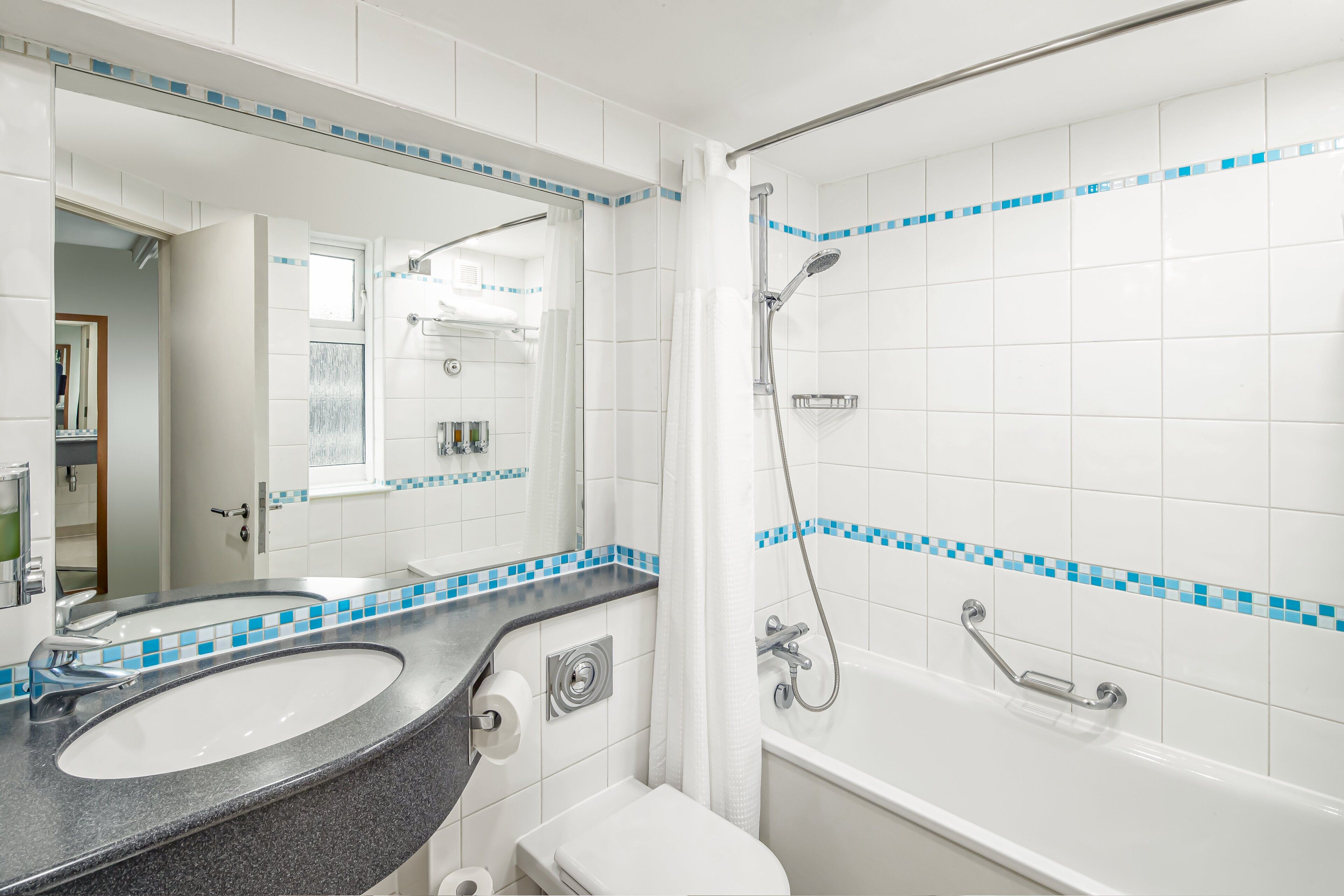 standard room, multiple beds | bathroom | combined shower/bathtub, eco-friendly toiletries, hair dryer, towels