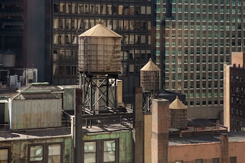 Hotel room view looking out at Park Central Hotel New York