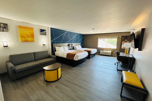 Basic Suite, Multiple Beds, Non Smoking | 1 bedroom, in-room safe, desk, laptop workspace